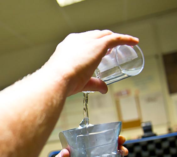 RAF Environmental Health Practitioner measuring liquid sample