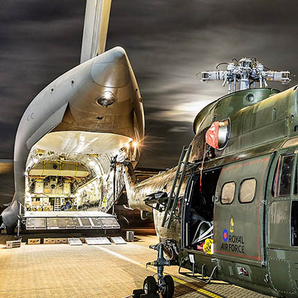 RAF Puma helicopter prepared for loading onto C17 transport aircraft