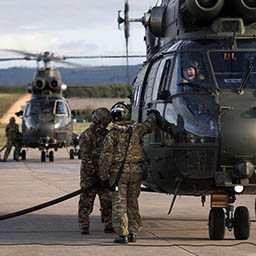 RAF Suppliers refuelling RAF Puma helicopters while engines running