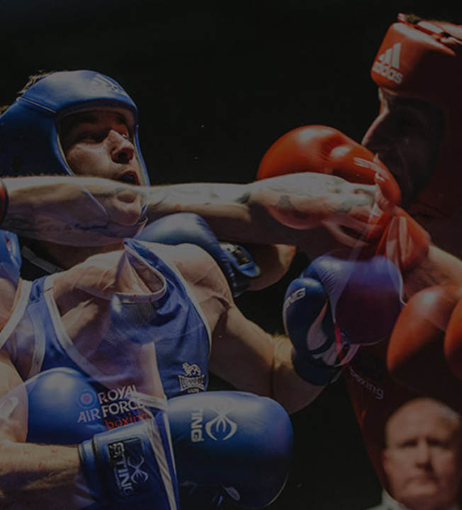 RAF boxers in red and blue strips in boxing match (multiple exposure photograph)
