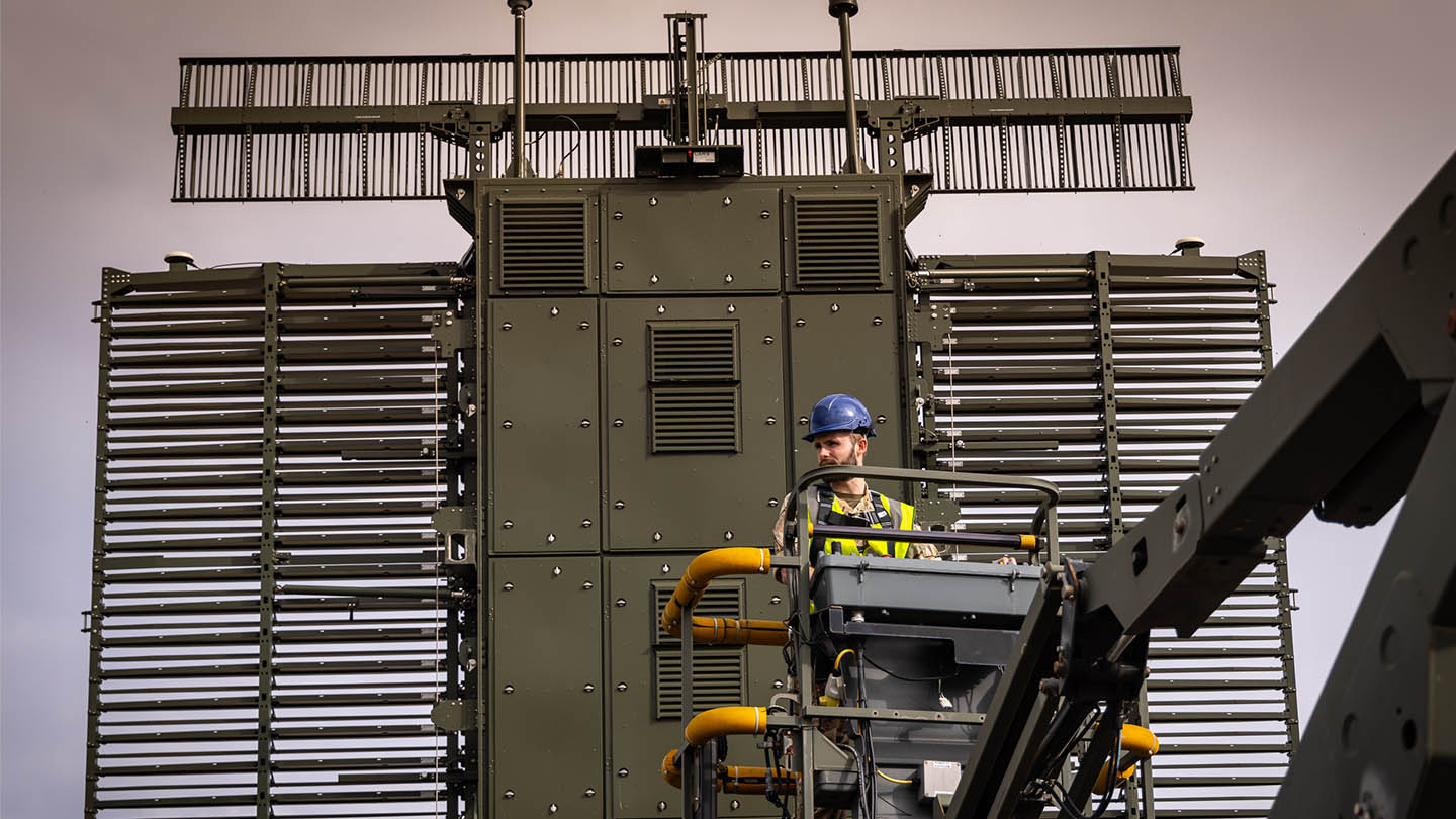 RAF Cyberspace Communications Specialist in platform lift to work on radar array
