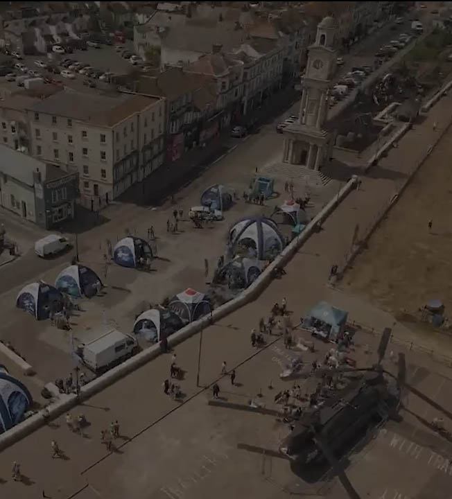 Aerial photograph of RAF Town Show in 2025 showing visitors, RAF personnel, tents and Chinook facsimile exhibit