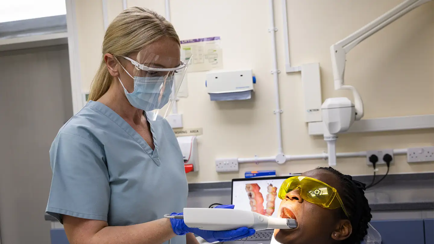 RAF Dental Nurse treating RAF patient in RAF Dental Surgery