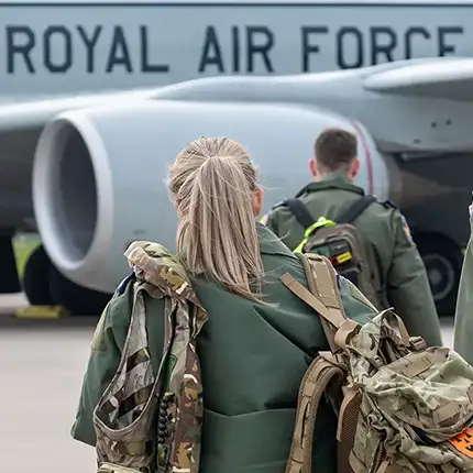 RAF Aircrew linguists walking out to board RAF Rivet Joint aircraft