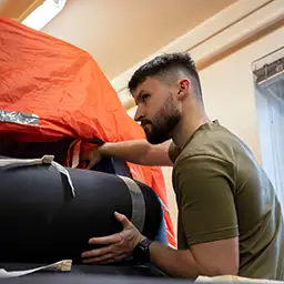 RAF Aircraft Technician - Survival Equipment inspecting inflatable life-raft