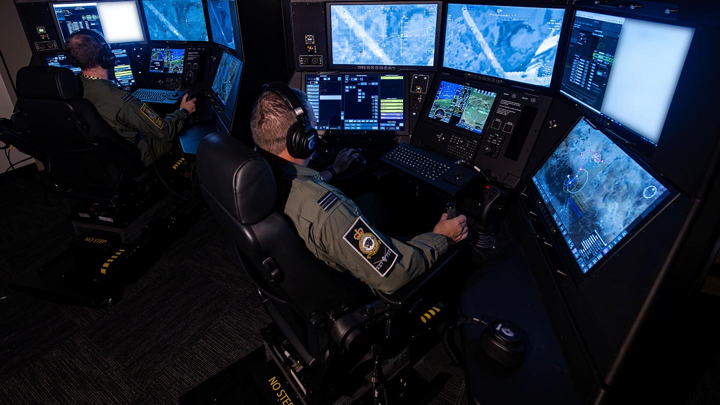 RAF Weapon Systems Officer (WSO) remotely controlling sensors on board a RAF Protector RG Mk1 remotely piloted aircraft