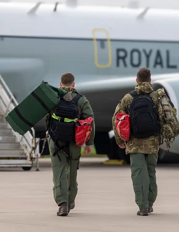 RAF Aircrew linguists walking out to board RAF Rivet Joint aircraft