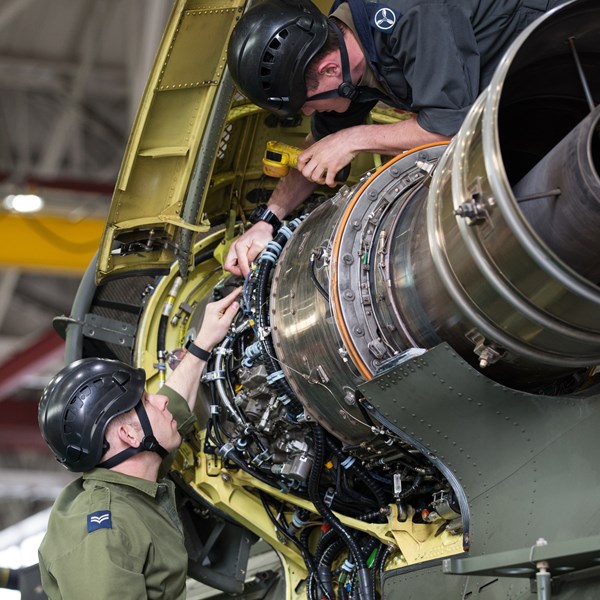 Aircraft Technician (Mechanical) working on Chinook helicopter engine