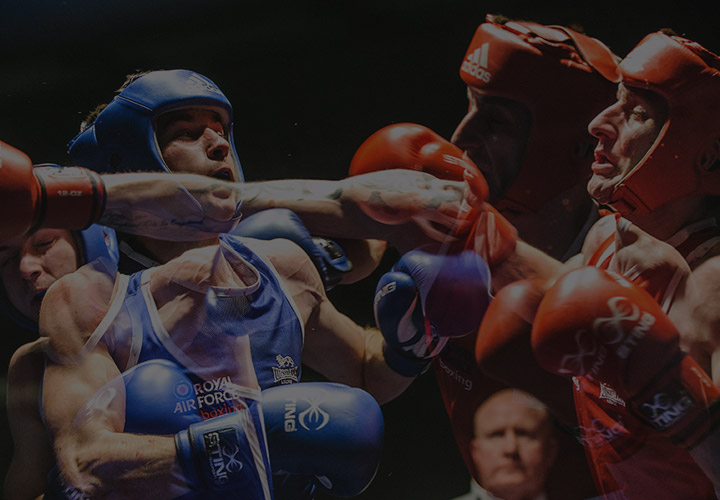 RAF boxers in red and blue strips in boxing match (multiple exposure photograph)