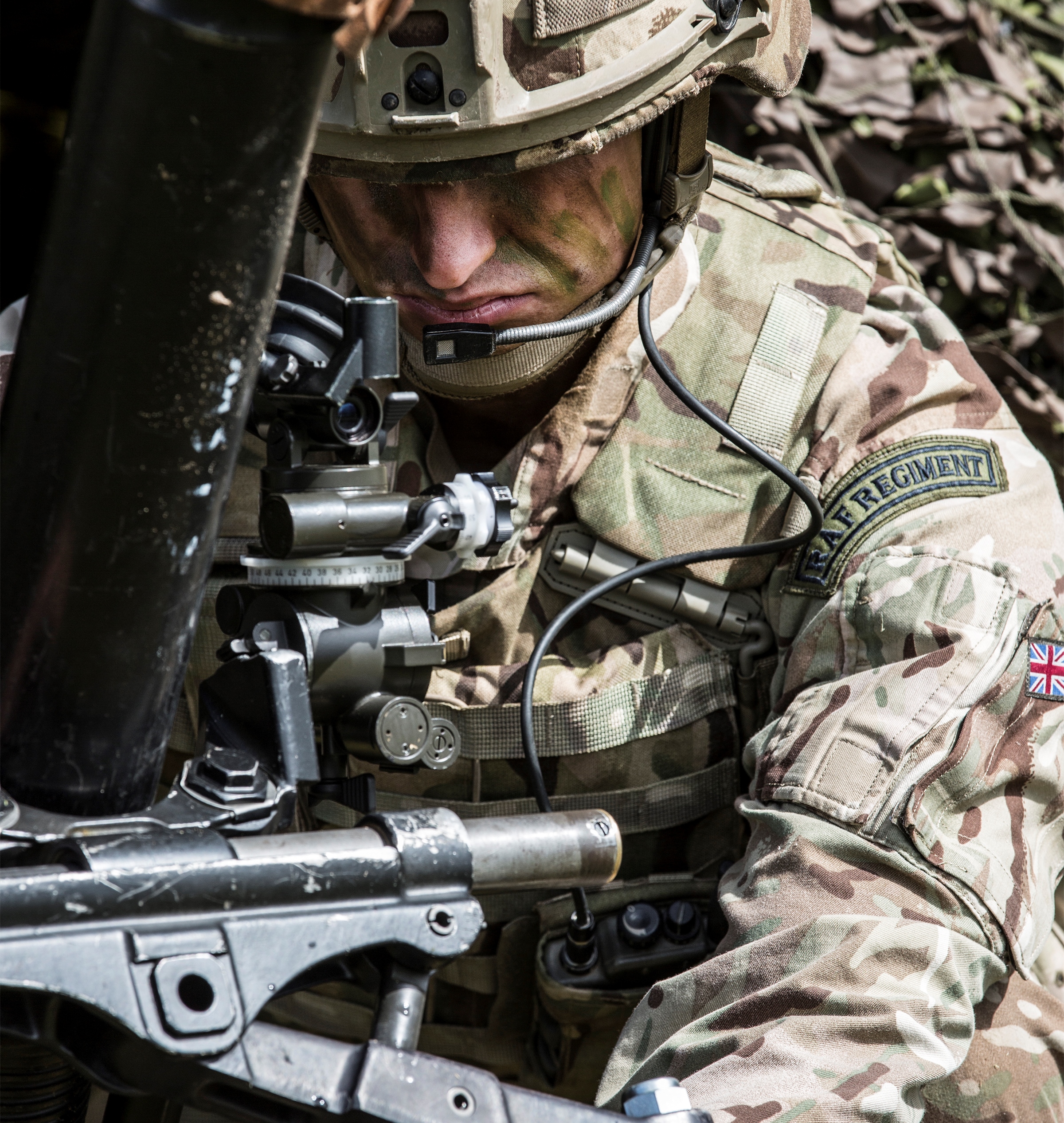 RAF Regiment Gunner preparing 82mm mortar